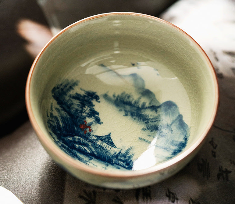 Hand-painted 'Jiangshan' blue and white wood kiln old clay Pu'er cup